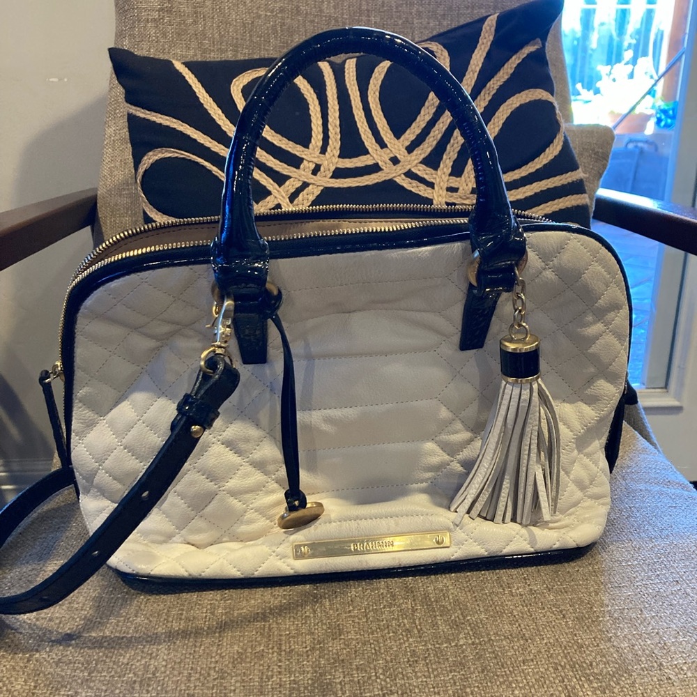 White Brahmin bag with black accents. Great used condition.